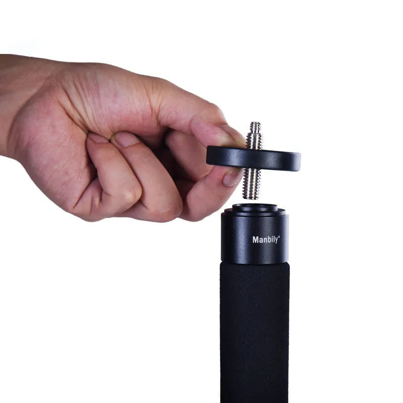 Manbily A-555 aluminium alloy camera monopod in black, extended to full height with three-prong stabiliser attached
