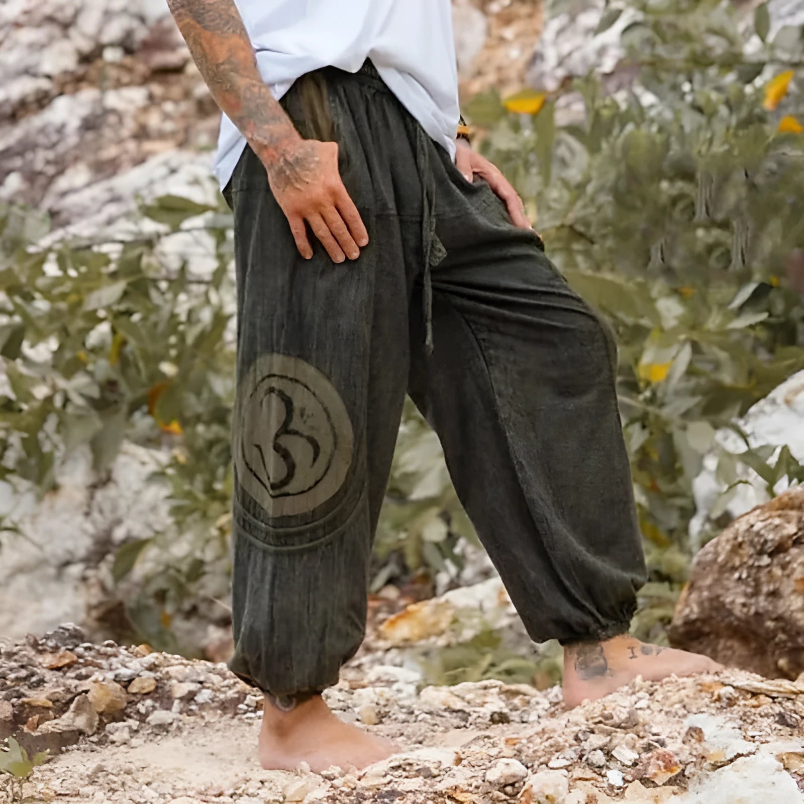 Dark green men's casual trousers with ethnic pattern and ankle-tied closure