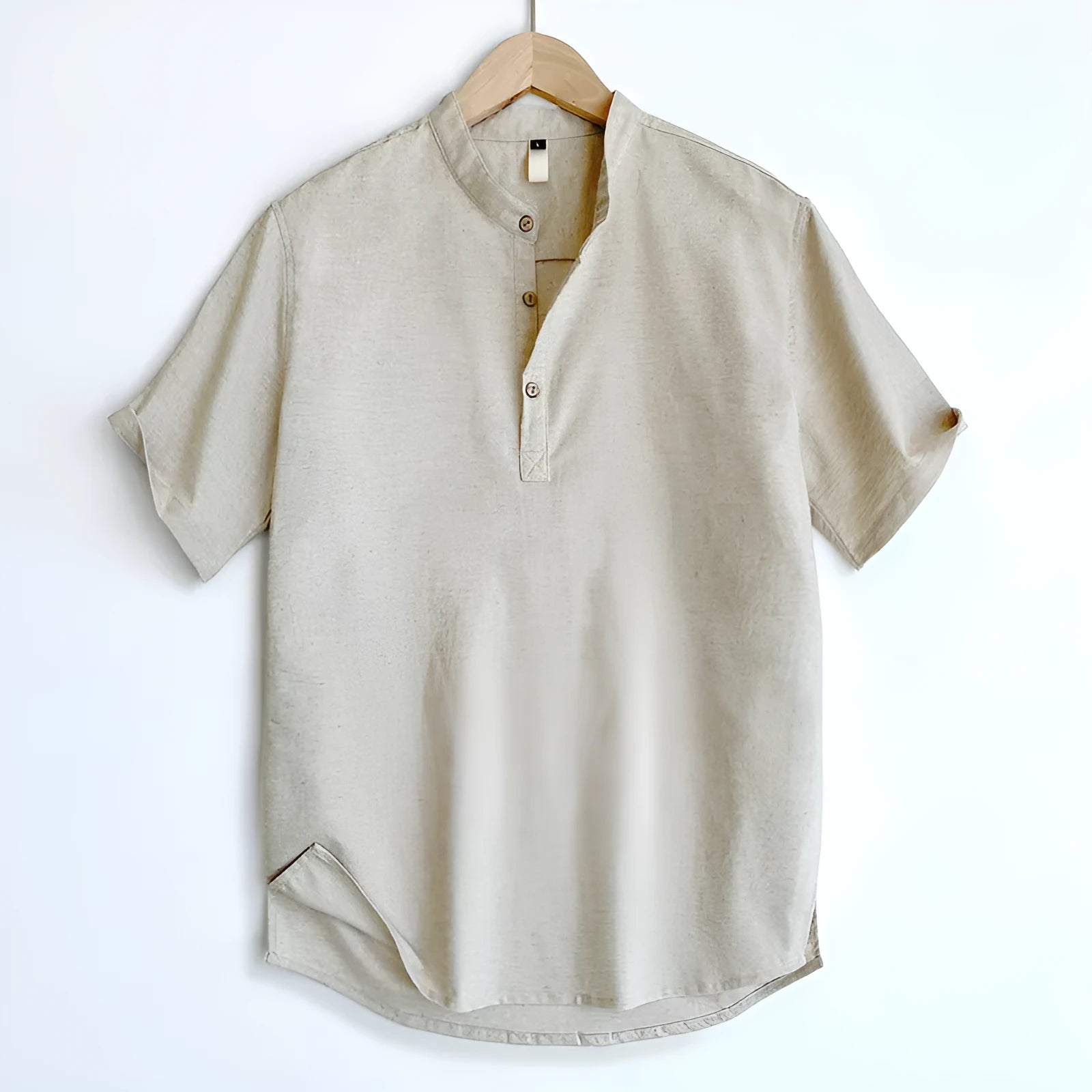 Men's solid colour short sleeve T-shirt in thin cotton linen blend fabric on a hanger.