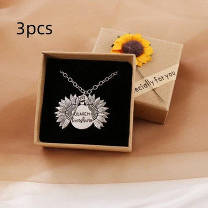 A stunning sunflower pendant necklace with an adjustable chain in various fashionable colors