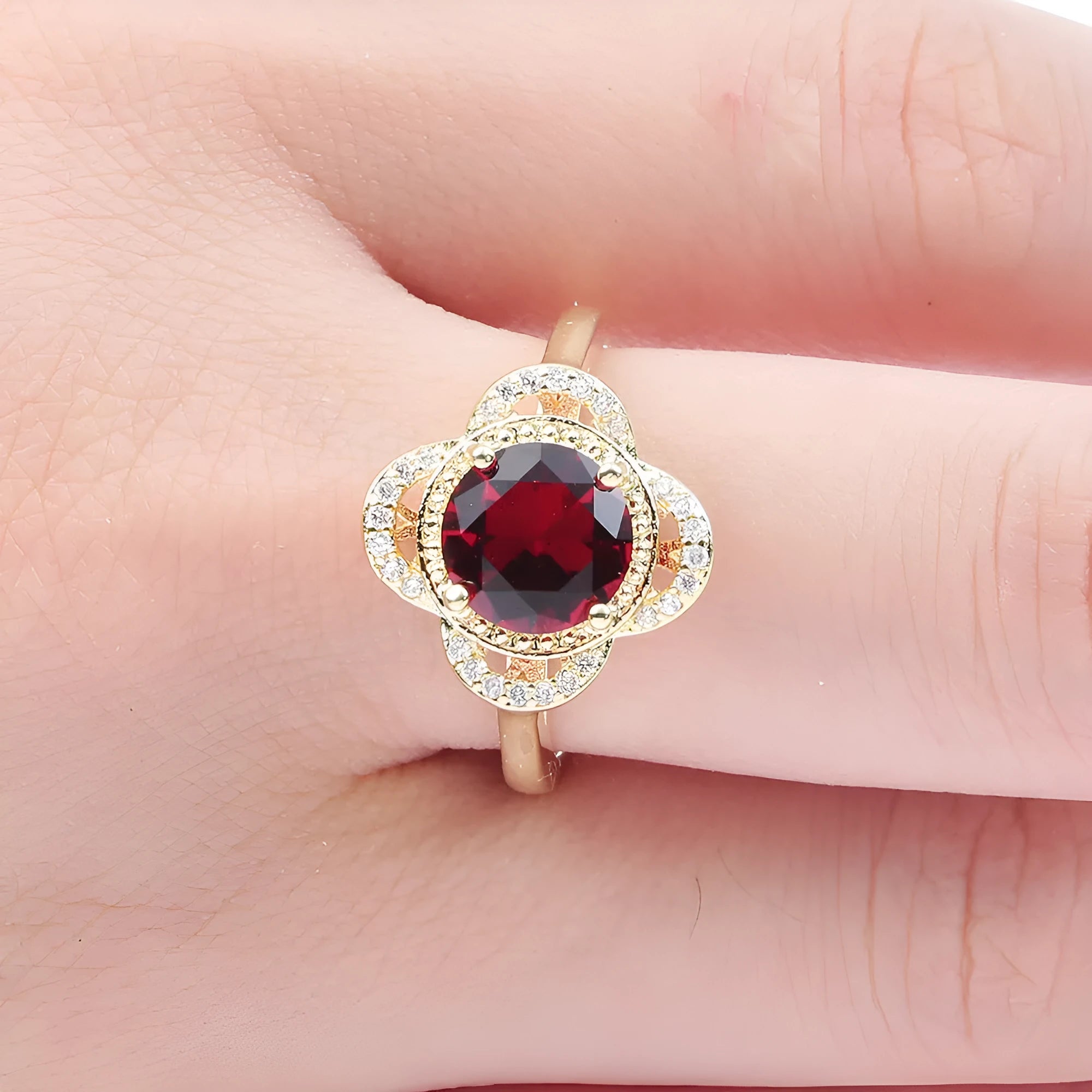 Copper zircon fruit-shaped ring with electroplated finish shown in size options