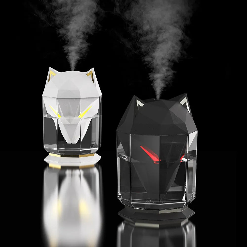 War Wolf black and white ultrasonic desktop humidifier with colourful LED lights on, showing mist outlet.