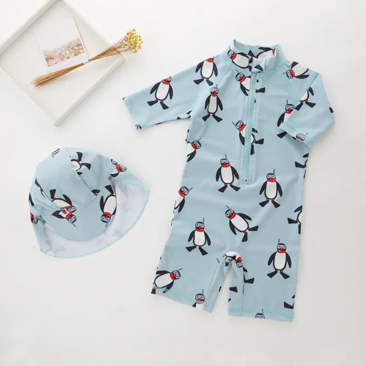 Boy's long sleeve penguin print swimsuit two-piece set with matching swimming cap