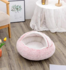 A soft, plush pet bed in various colors, including olive green, brown, pink, and grey, designed for the comfort and relaxation of cats and dogs.