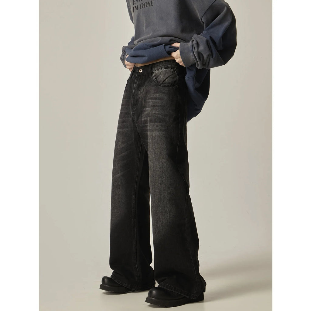 Black loose straight retro jeans with zipper fly shown from front and back views