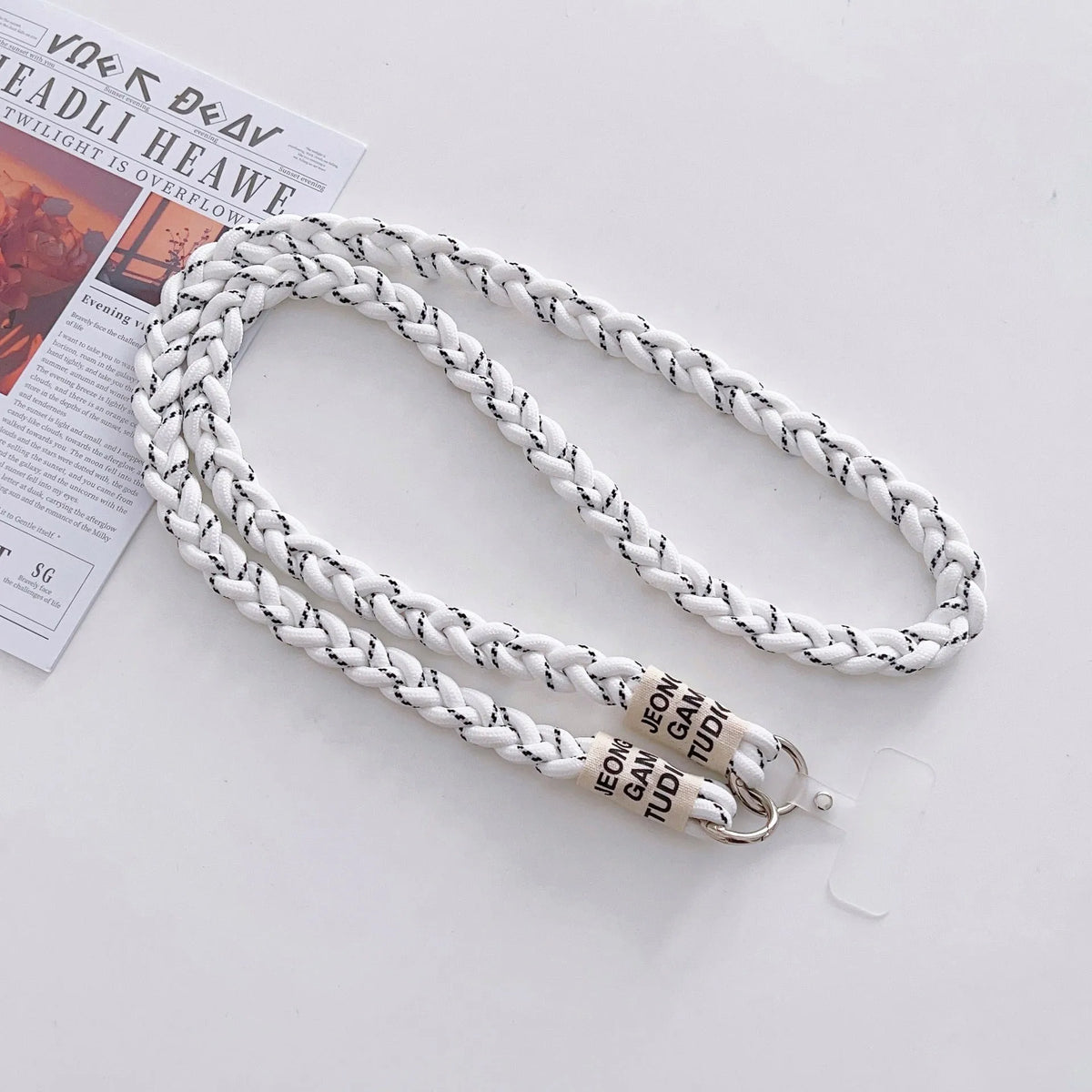 Long crossbody nylon phone lanyard with three-strand horse tail pendant and clip in assorted colours