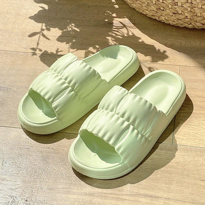 Stylish women's bathroom slides with soft, comfortable EVA soles and unique floral accents in a variety of vibrant colors