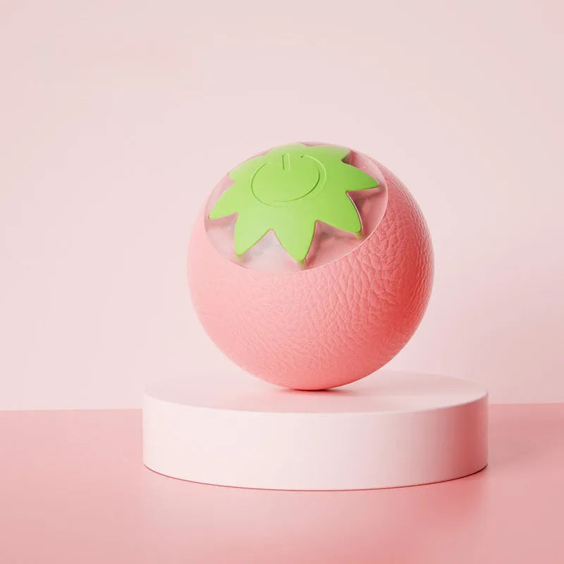 Green electric rolling ball toy for dogs and cats measuring 4.5cm