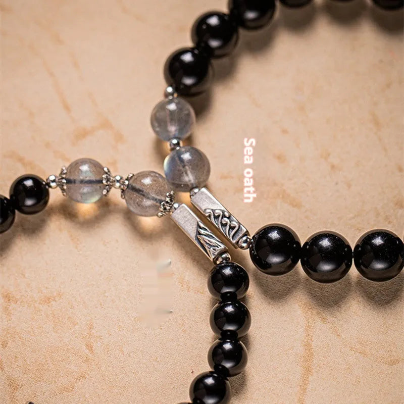 Obsidian Buddha beads couple bracelet DIY kit showing 8mm and 10mm beads with national style design