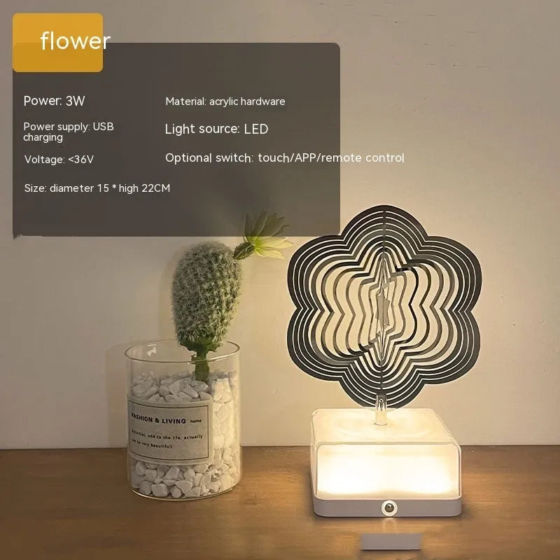 3D rotating LED night light in acrylic and metal with USB charging, 3W output, and ten decorative shapes