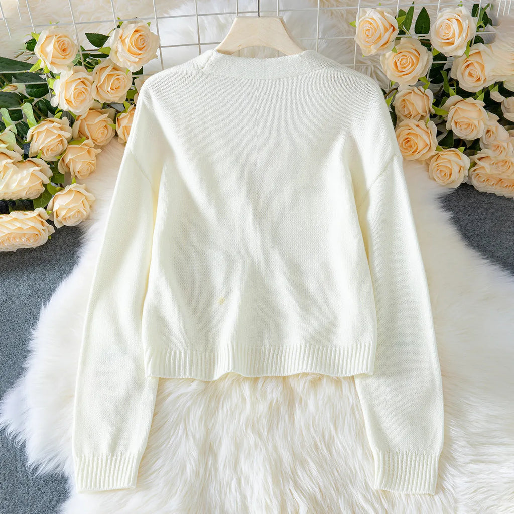 3D strawberry pattern women's acrylic knit sweater in milky white with long sleeves and regular fit