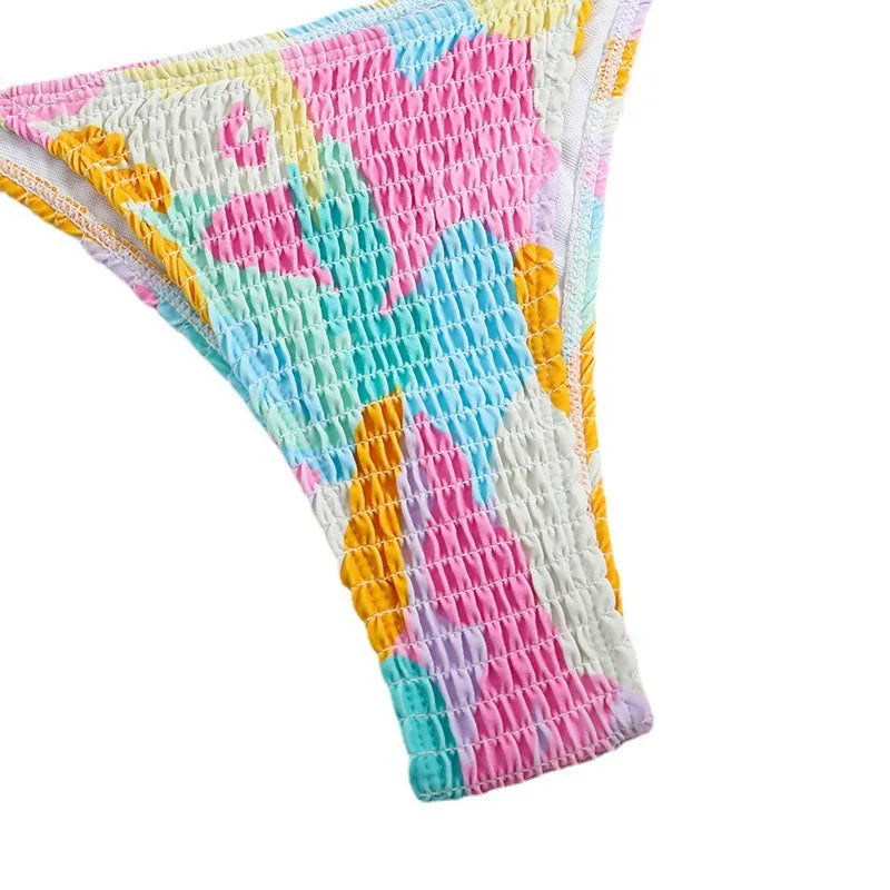 Women's triangle bag bikini with printed floral gradient pattern and smocking craft detailing