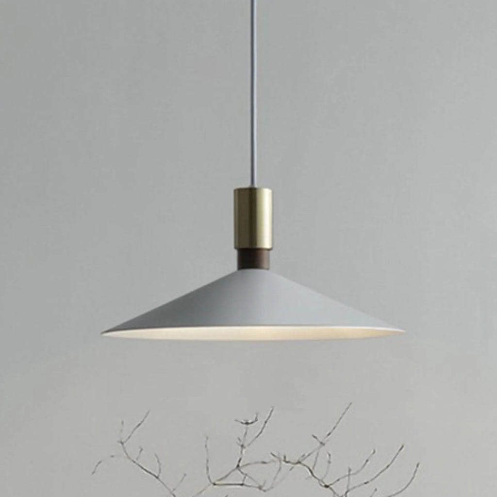 Modern round single-headed iron bar lamp in black, shown hanging over a dining table.