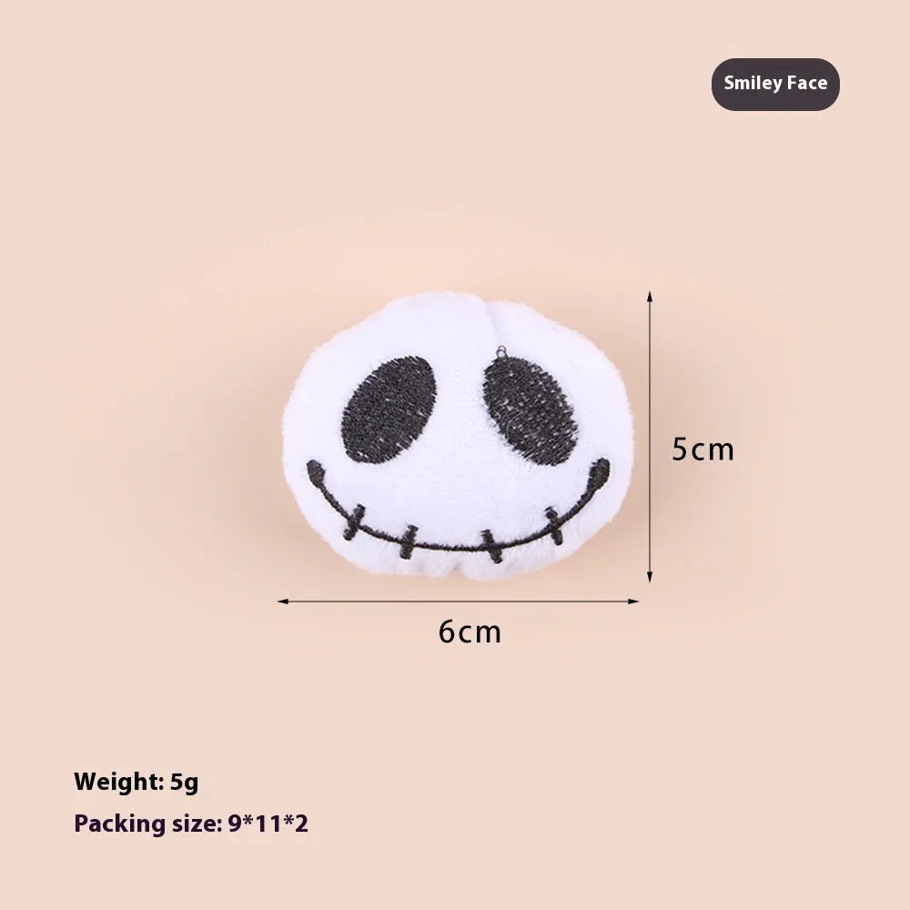 Plush cat teaser wand with candy-shaped attachment for interactive play