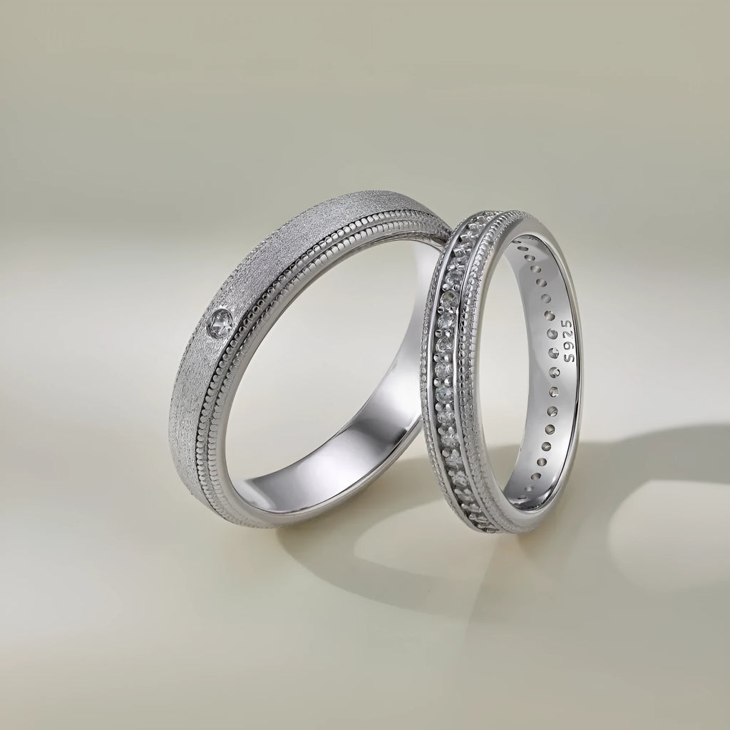 S925 sterling silver couple ring with geometric shape and platinum electroplated finish on neutral background