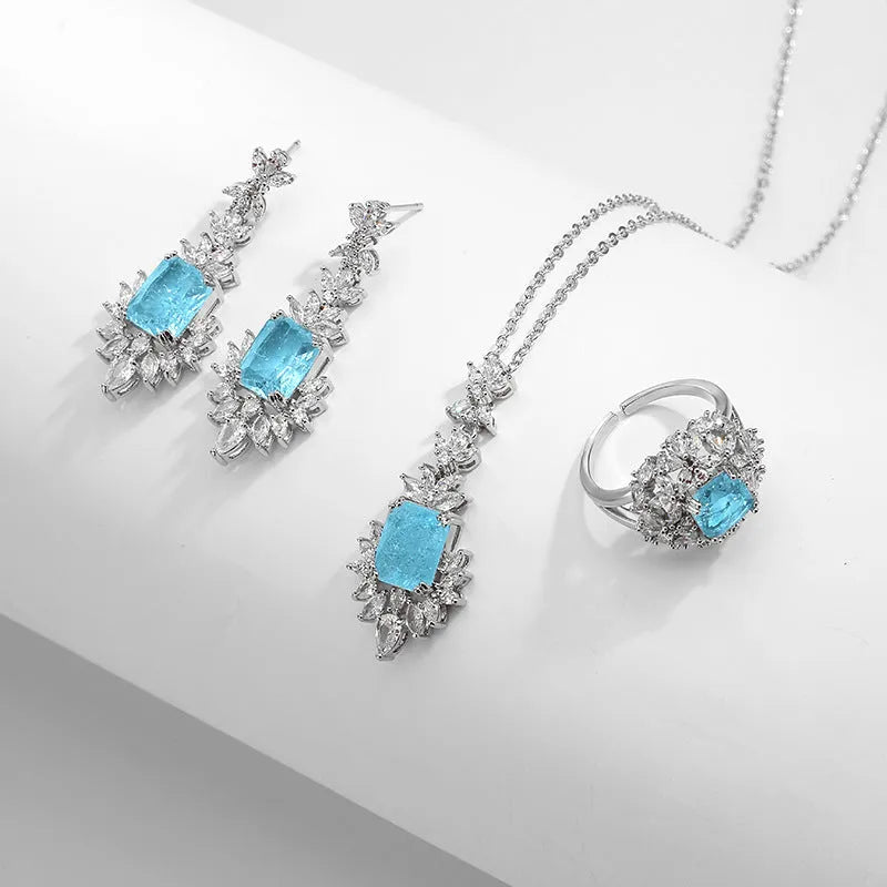 Coloured gem blue zircon necklace with copper material and quadrilateral design element