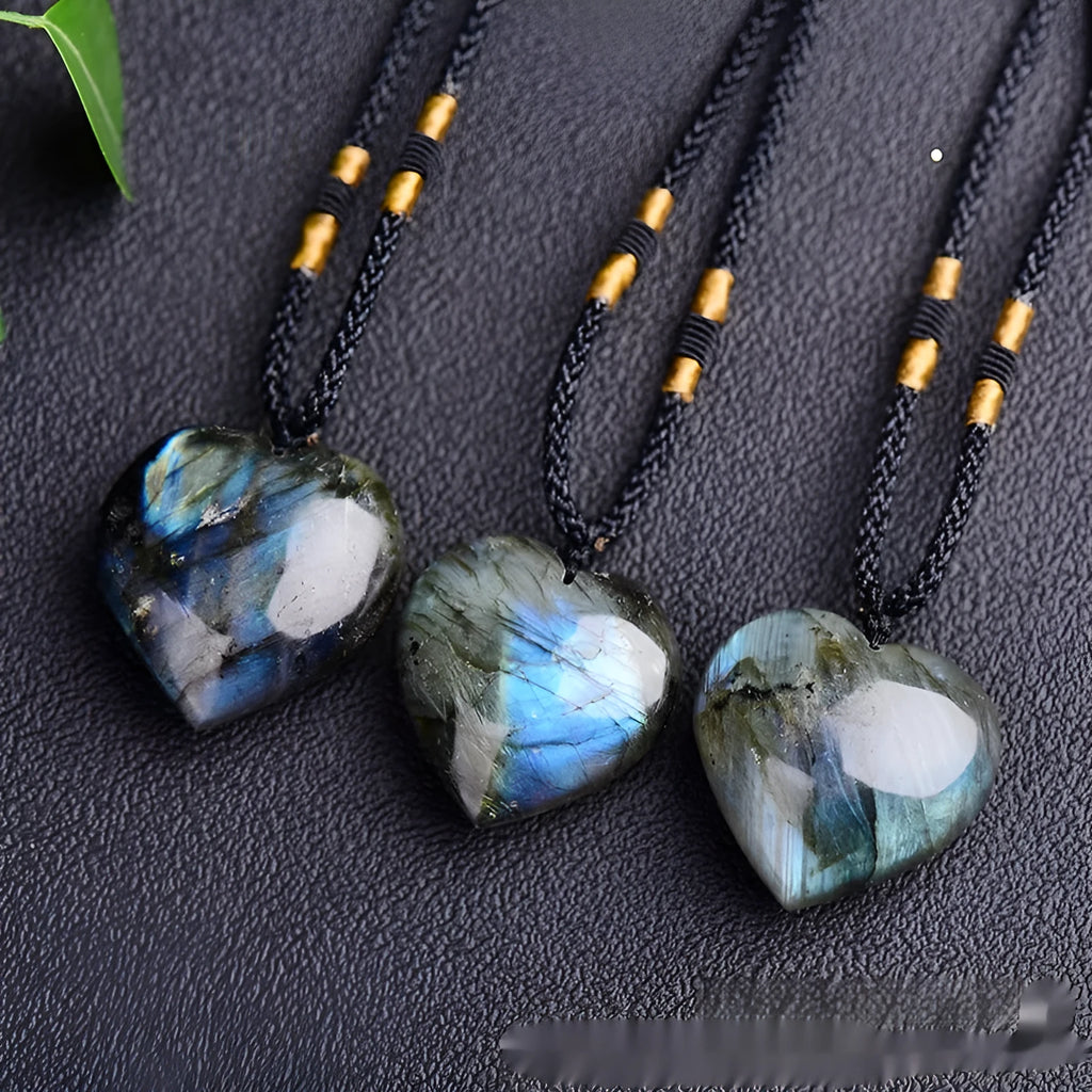 Blue labradorite moonstone heart of the ocean geometric pendant necklace on a chain.