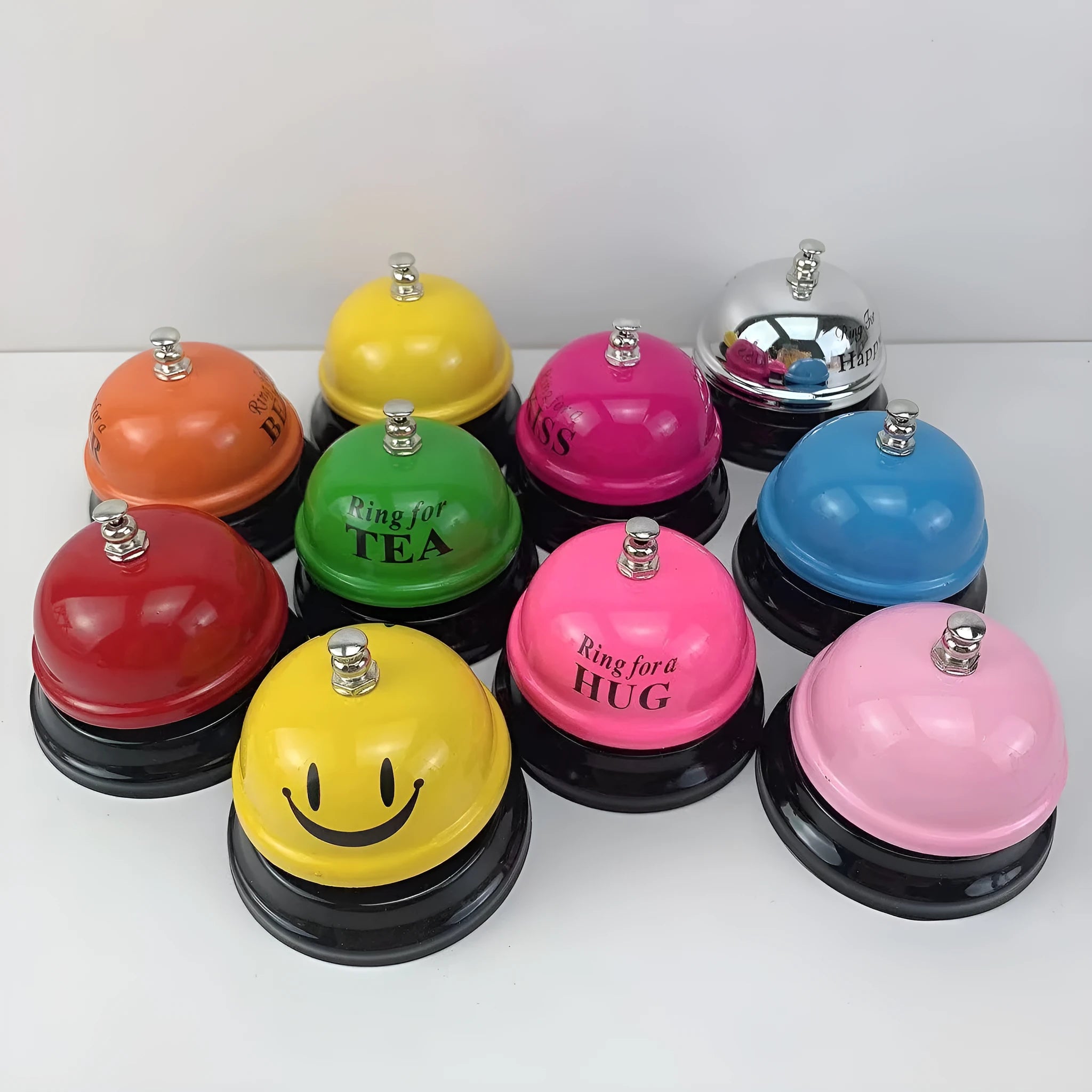 Iron game bell in various colours including red me and rose kiss options