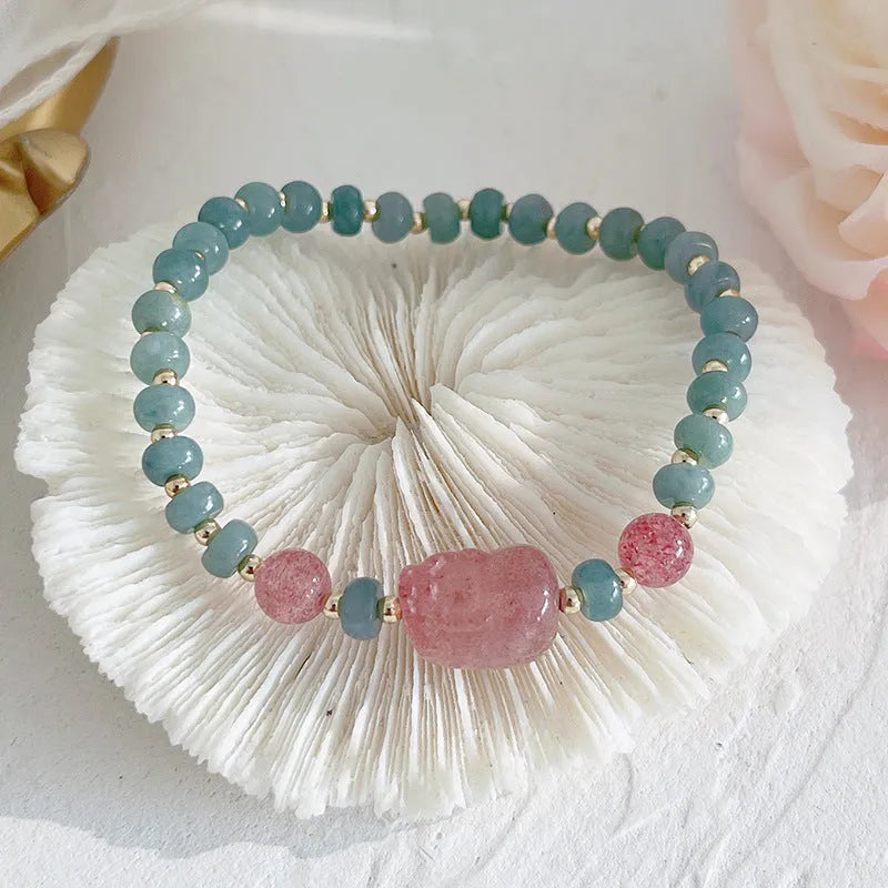 Natural blue water Hetian jade bracelet with carved gourd charm and engraved peace buckle