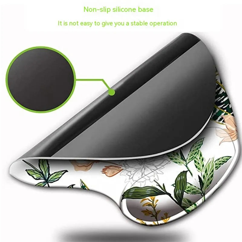 Black silicone keyboard pad with floral pattern and integrated wrist strap for wrist support