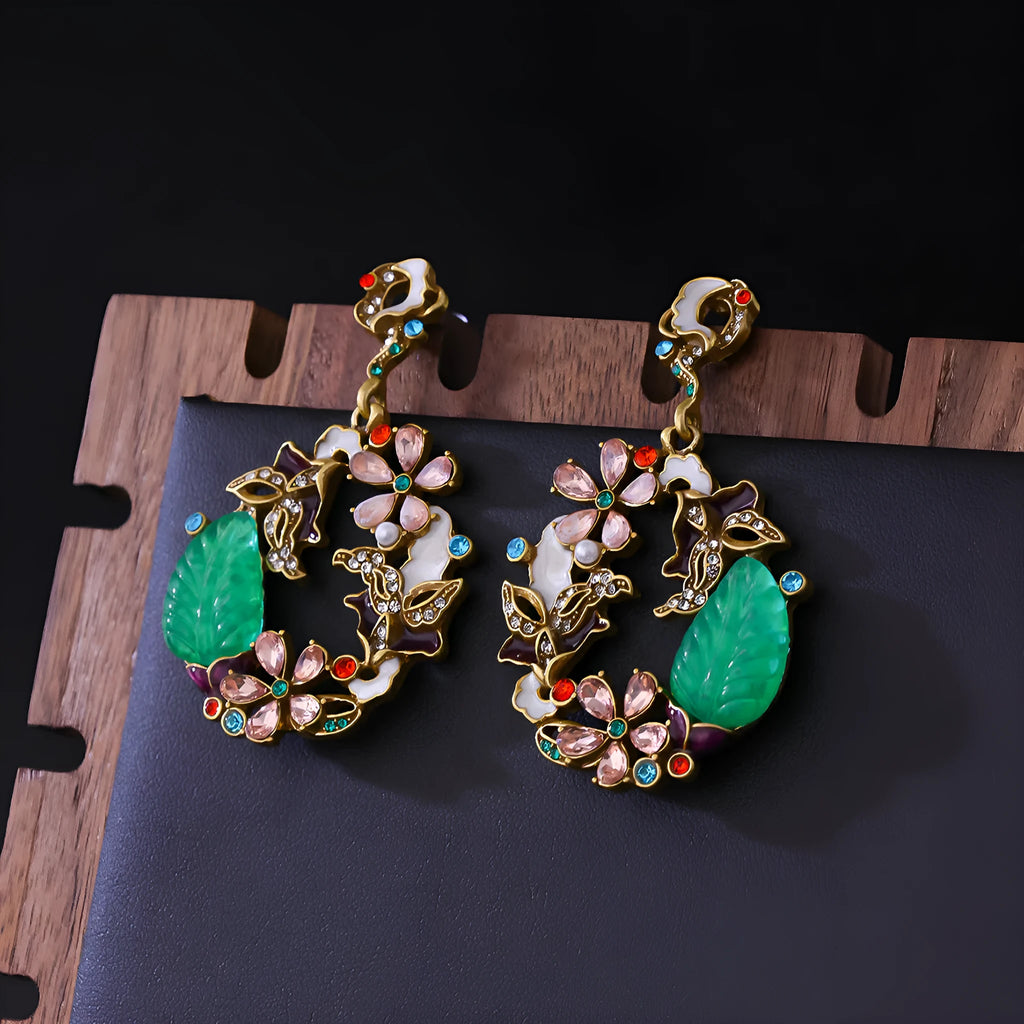 Light luxury distressed alloy earrings with diamond-embedded resin flower and Chinese style garland eardrop design