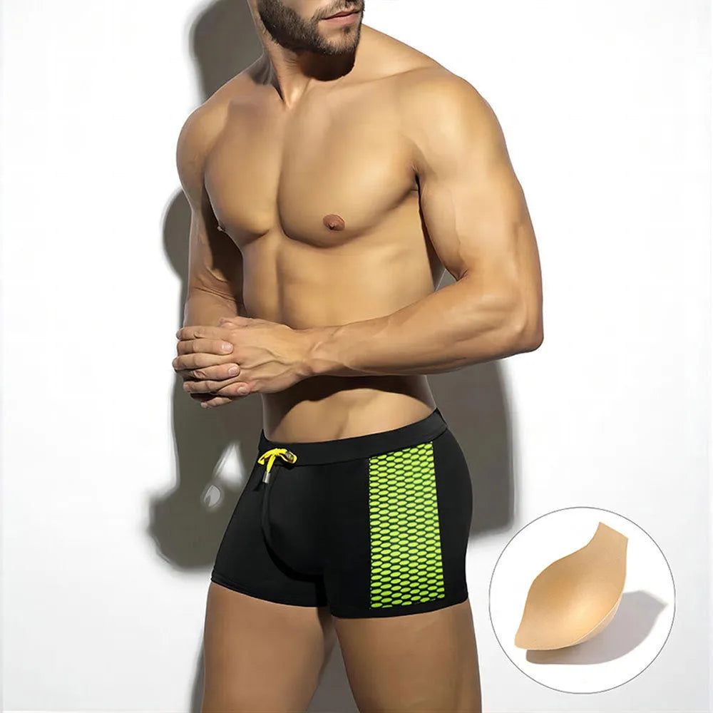 Polka dot print swimming boxers in quick-dry nylon shown in yellow, black, and dark blue colour options.