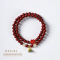 Purple gold sand bracelet with lotus seedpod centre and double circle bead design on adjustable string.