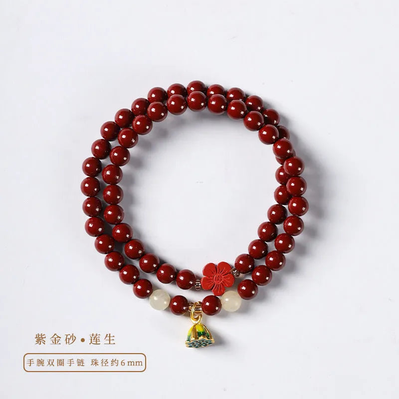 Purple gold sand bracelet with lotus seedpod centre and double circle bead design on adjustable string.