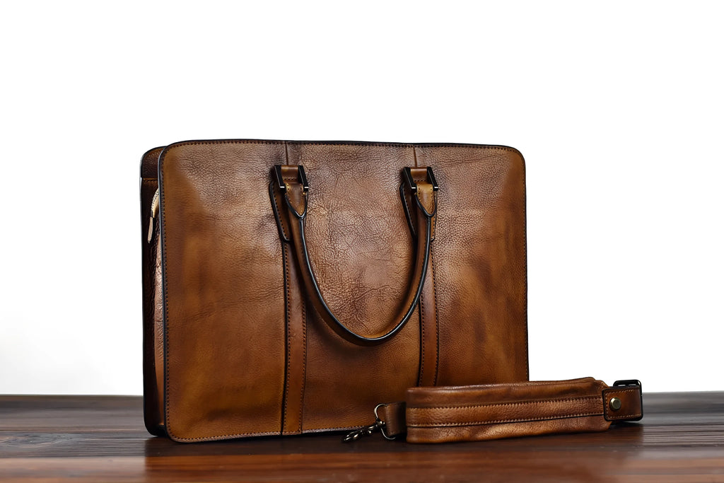 Men's 14-inch vegetable tanned leather handbag in horizontal square design with zipper