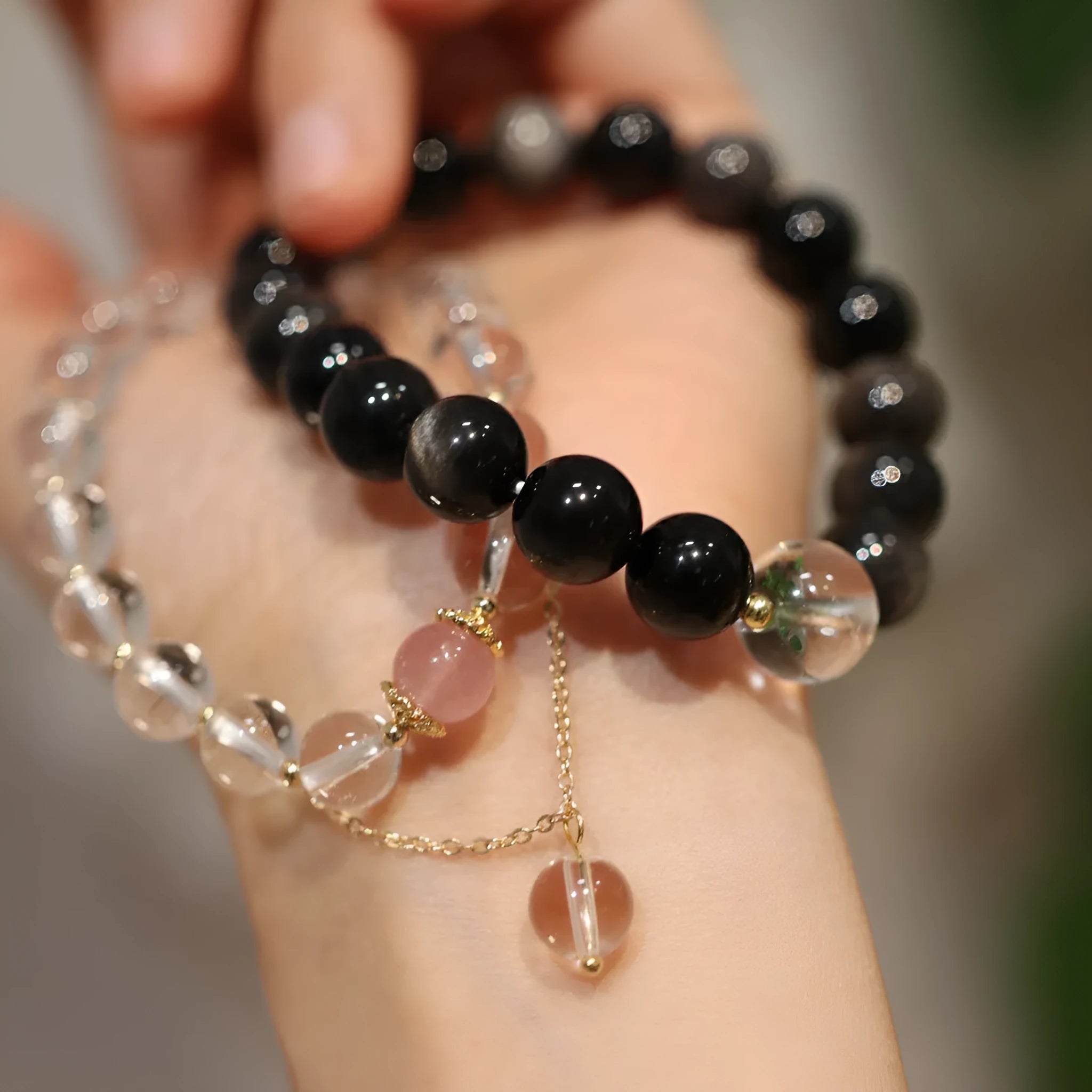 White crystal bracelet with cat eye obsidian stone in geometric Chinese design