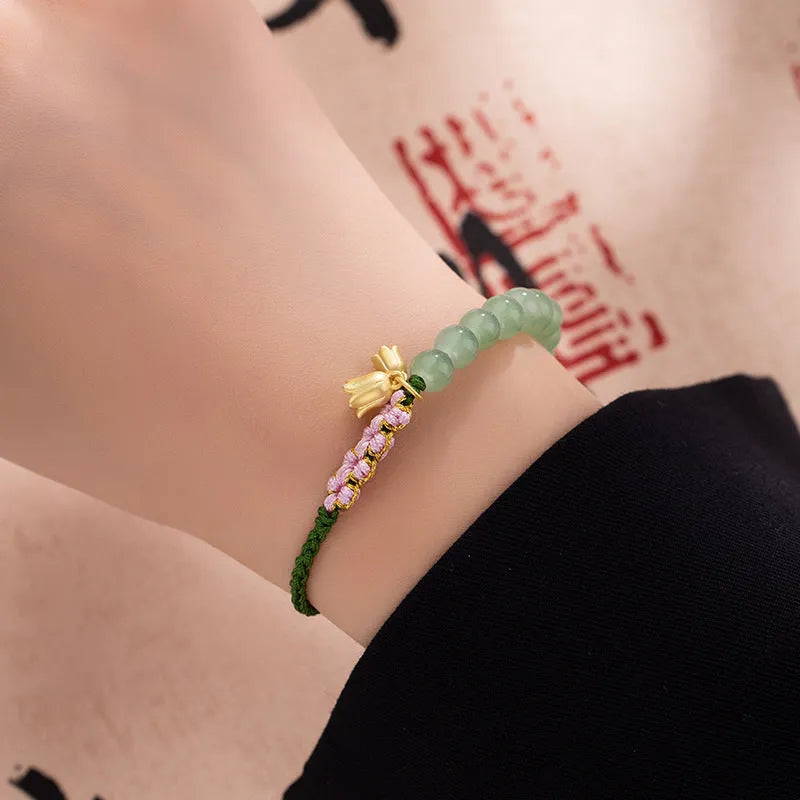 Red rope hand-woven bracelet with lily design and floral elements for women
