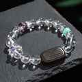 Natural white crystal ebony five bead ethnic bracelet with adjustable fastening
