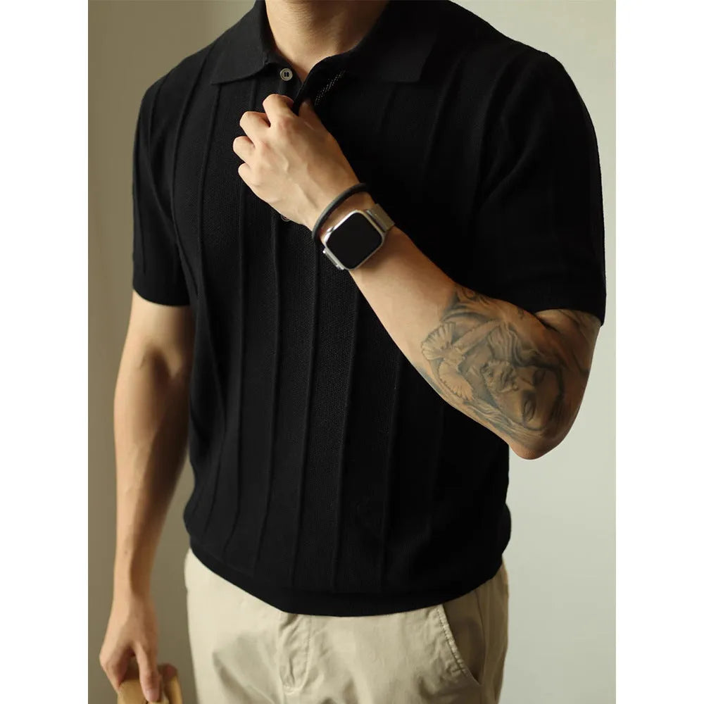 Man wearing a solid black loose fit basic polyester T-shirt for casual wear.