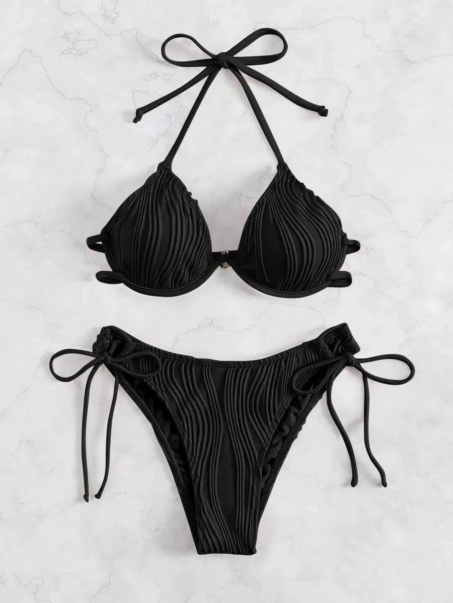 Women's apricot coloured underwire bikini top and bottom set for swimming.
