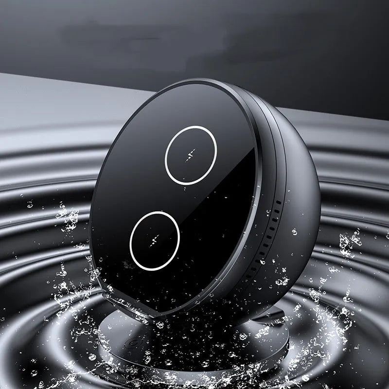 XC-11 black wireless charging phone holder with integrated Bluetooth speaker on a desk.