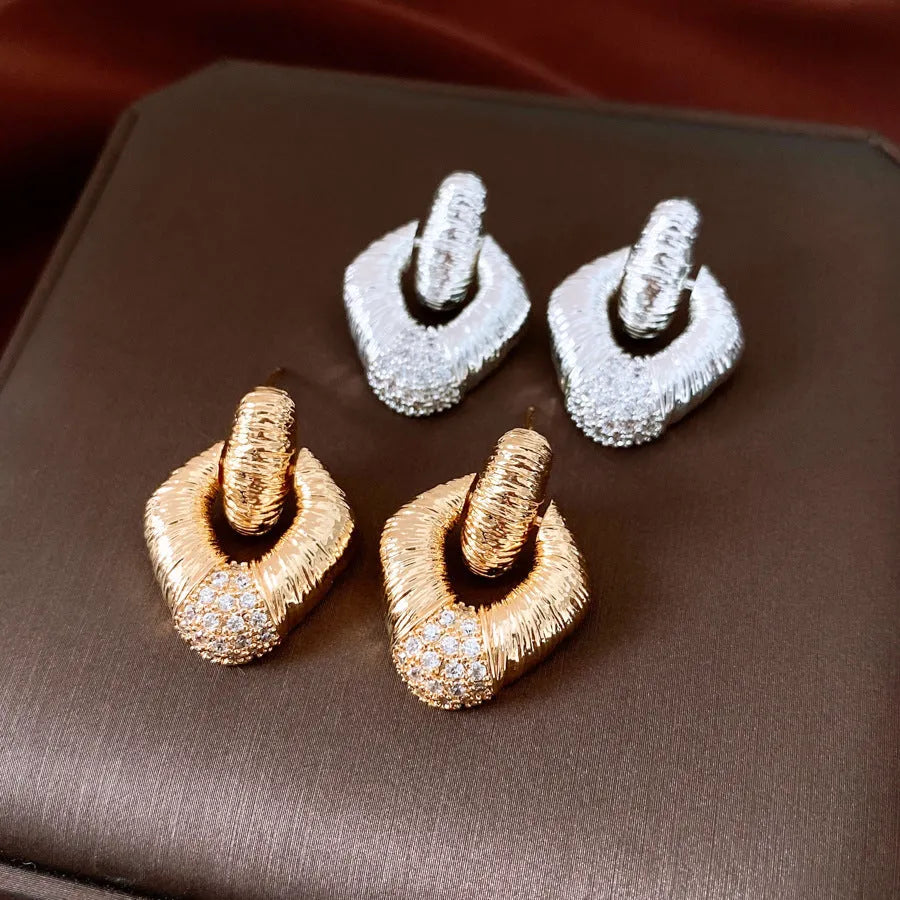 Copper diamond stud earrings with quadrilateral shape and silver needle finish for women