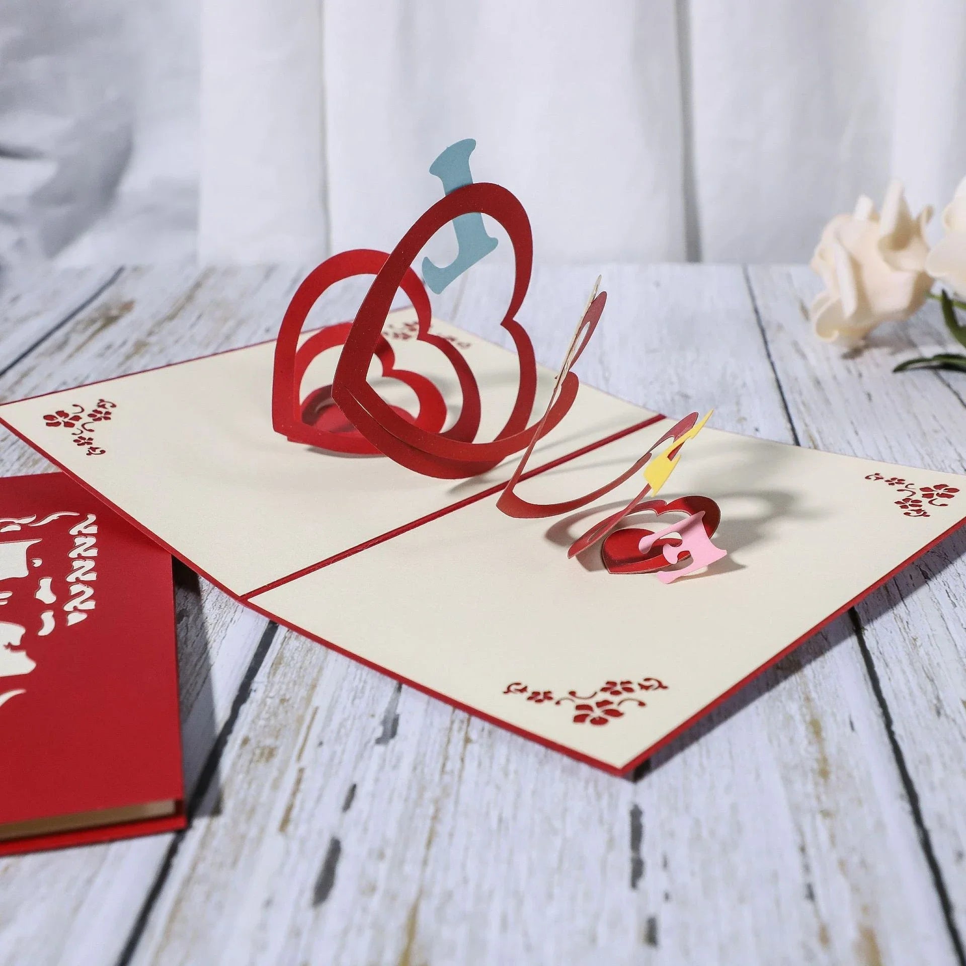 Elegant 3D pop-up wedding greeting cards with intricate laser-cut designs and 3D scenes for engagements, weddings, and anniversaries