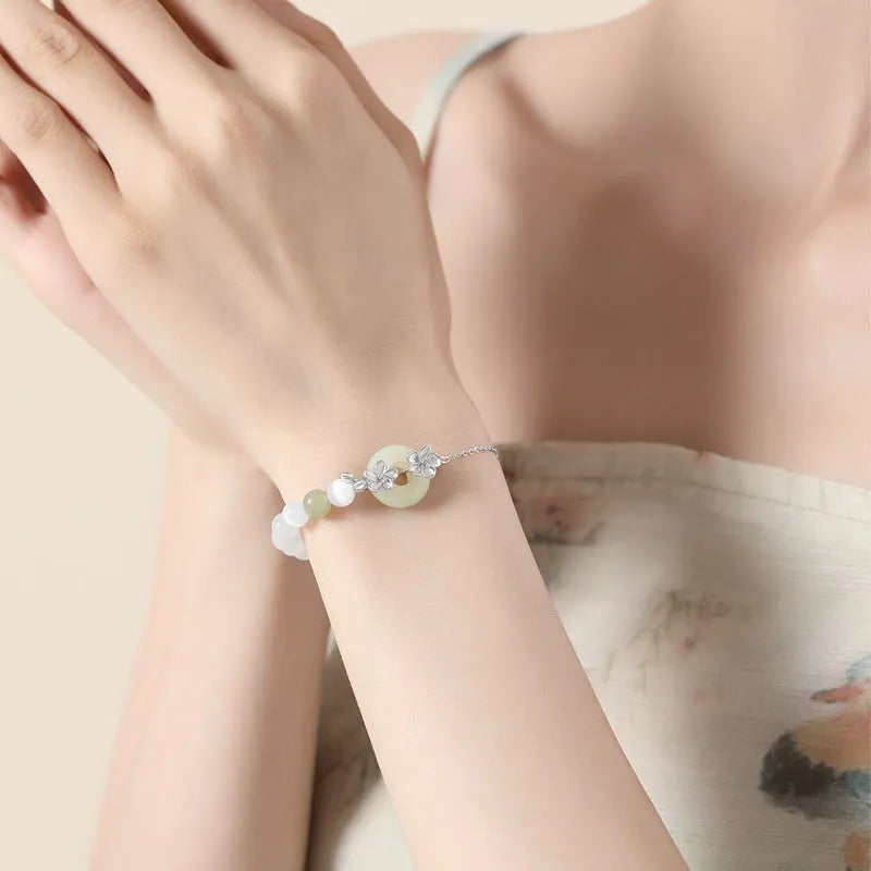 Pure silver peach blossom bracelet with safety buckle clasp in new Chinese style design