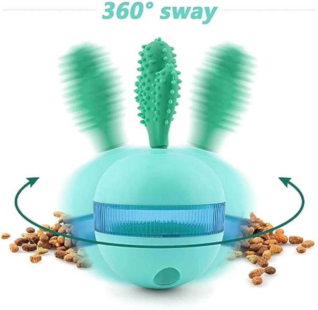 Blue and green durable rubber dog treat dispensing ball toy with small holes