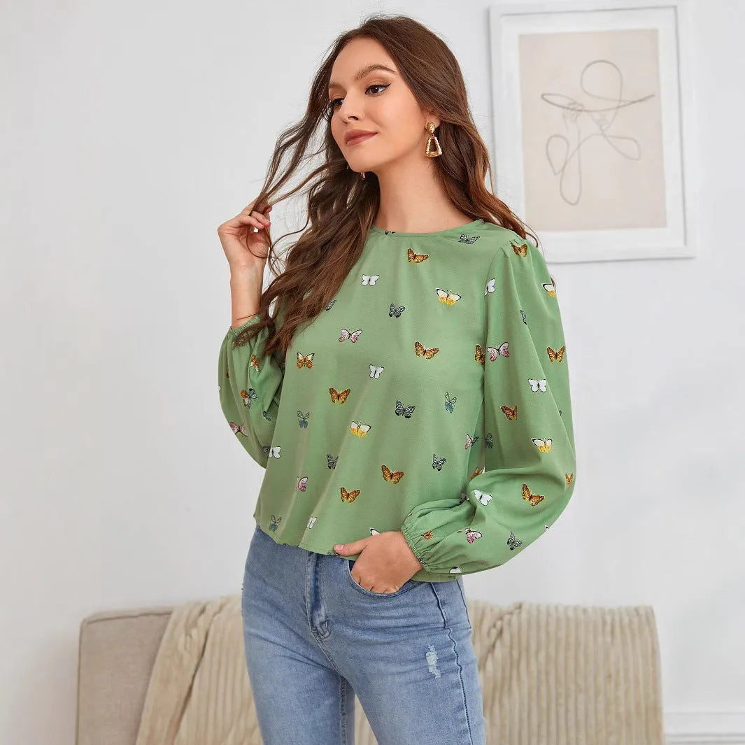 Women's long-sleeved butterfly print shirt in green and orange colour options