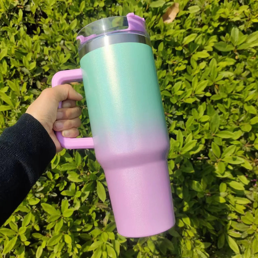 Large stainless steel vacuum flask in a gradient colour with lid, showing its height and diameter.