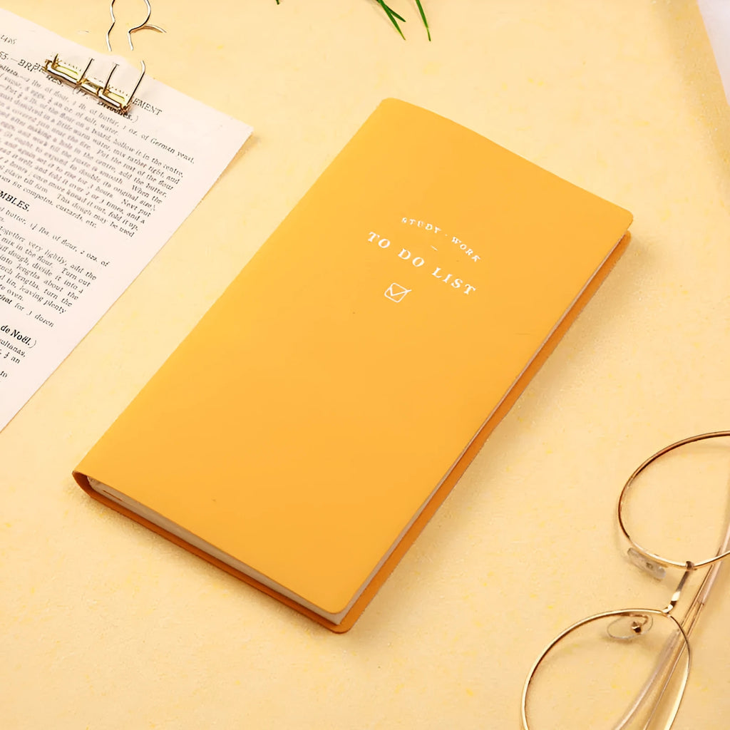 Simple style A6 portable todo list notebook with PU cover in macaron yellow, green, pink, or blue.