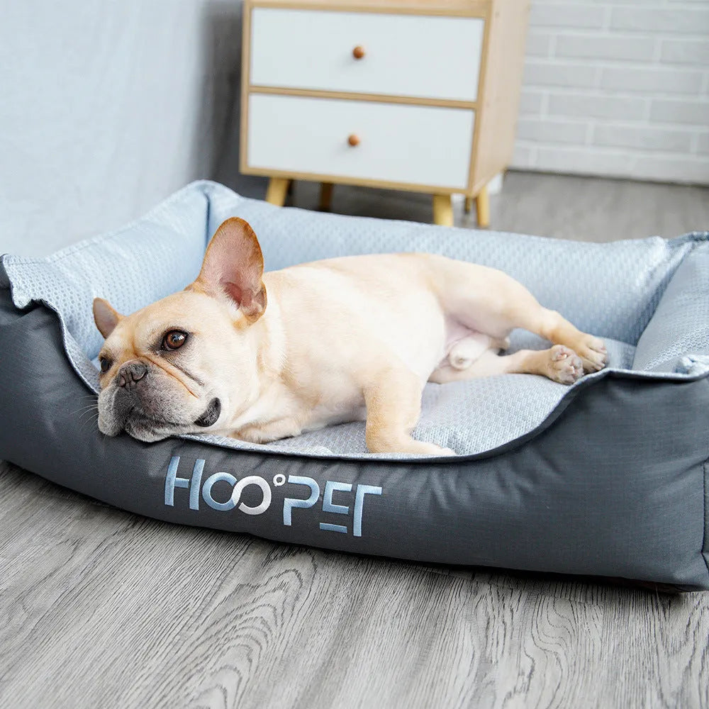 Soft grey dog bed with cat cave design and removable cover shown in small, medium, and large sizes.