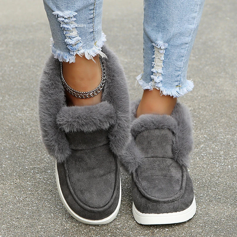 Cozy winter ankle boots for women with plush faux fur lining and suede upper in black, grey, and brown colors