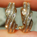 Geometric round copper earrings with gold finish on white background