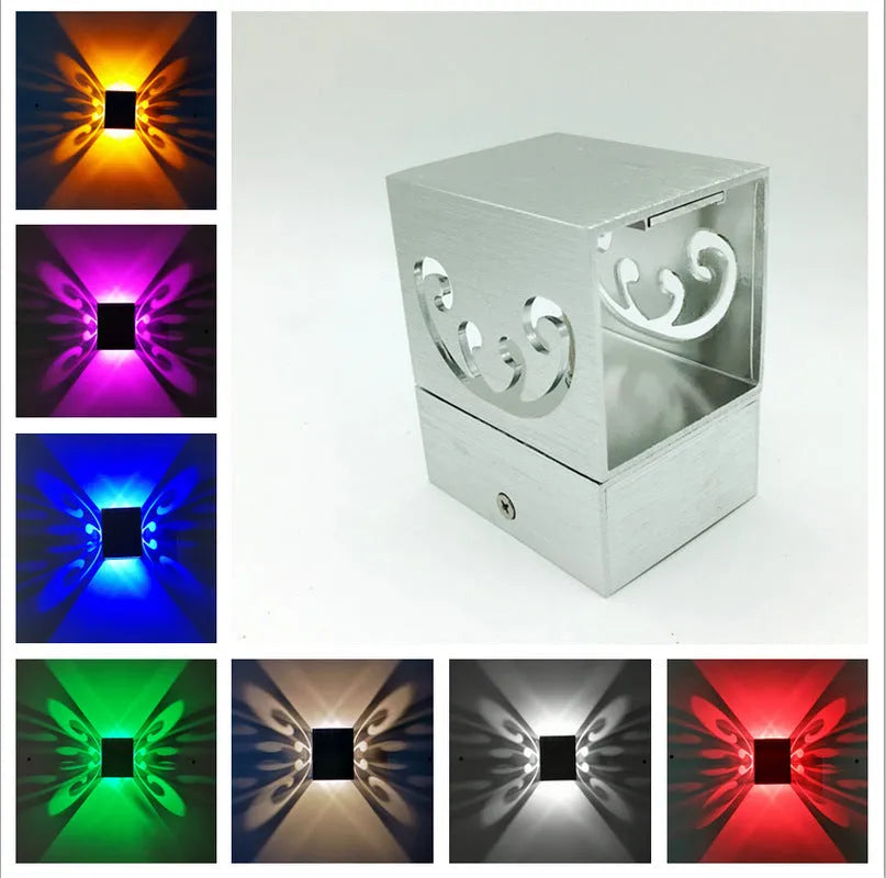 Modern aluminium LED butterfly wall lamp showing blue light colour option