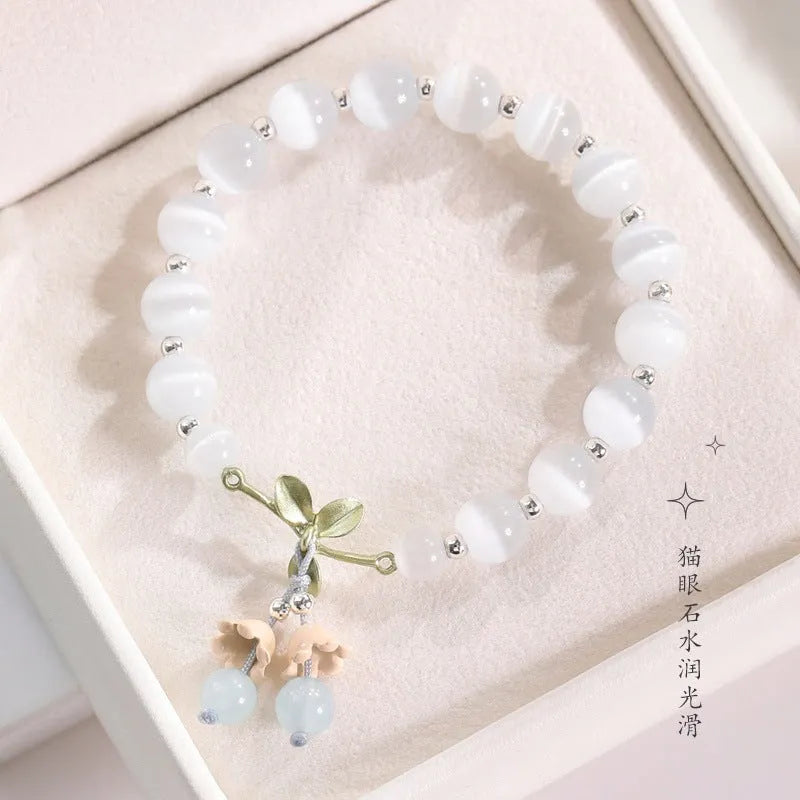 Adjustable cat's eye stone beaded bracelet with electroplated opal diamond-shaped beads in multiple colour options