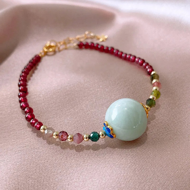 Women's garnet bracelet with aquamarine and tourmaline drop beads in Chinese Korean style design