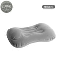 Inflatable travel pillow in flocked gray, navy blue, peacock green or pink colour measuring 45x30x13cm