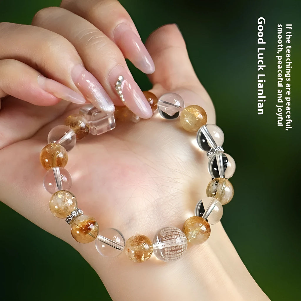 Handmade women's bracelet featuring freshwater pearls combined with citrine crystals